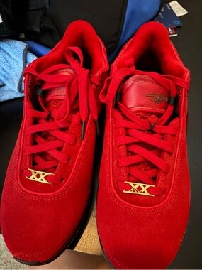 Nike Men's Red Athletic Sneakers with Gold Accents